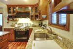 FiveStar Range and SubZero Refrigerator.